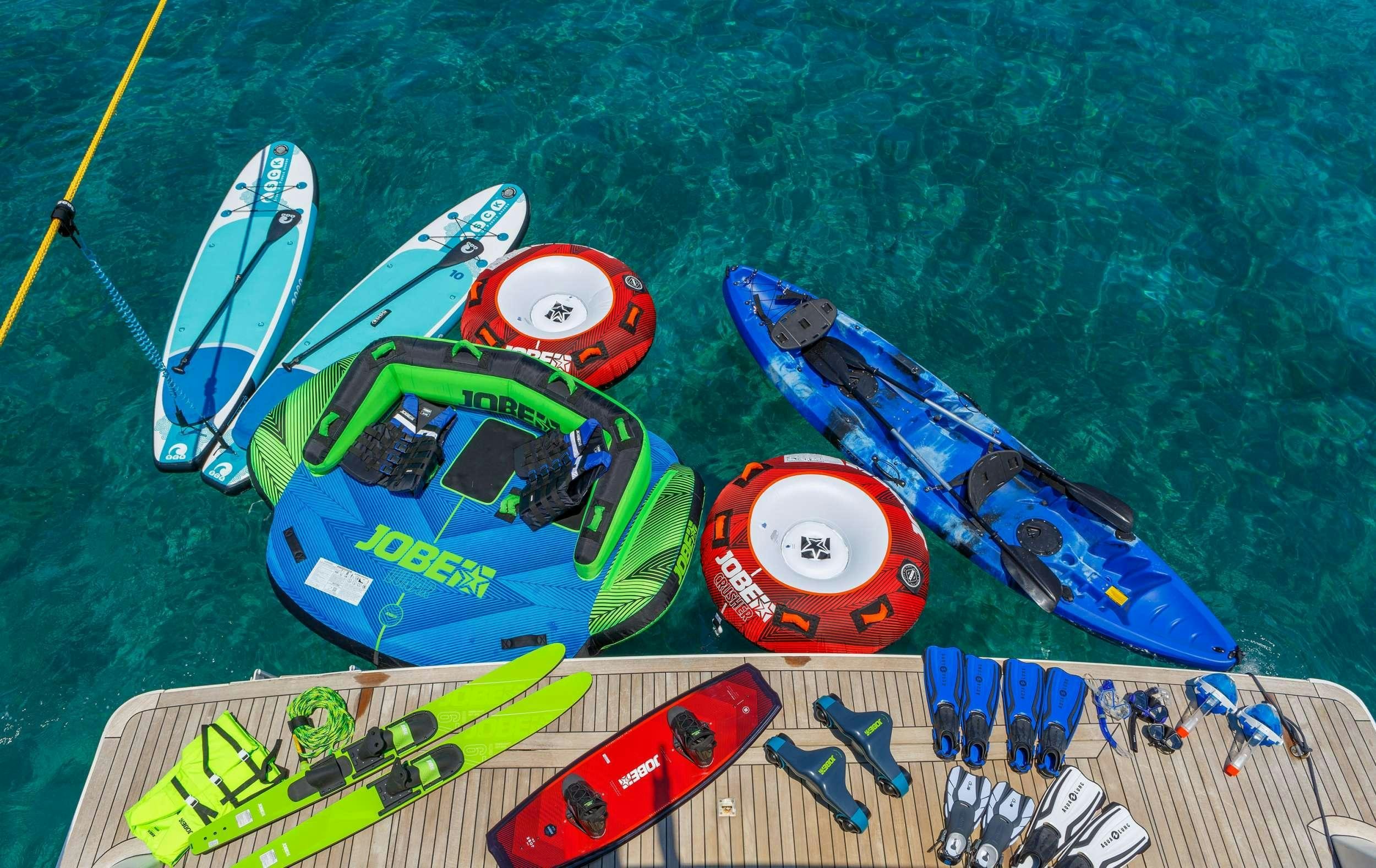a group of colorful kayaks aboard MY WAY Yacht for Charter