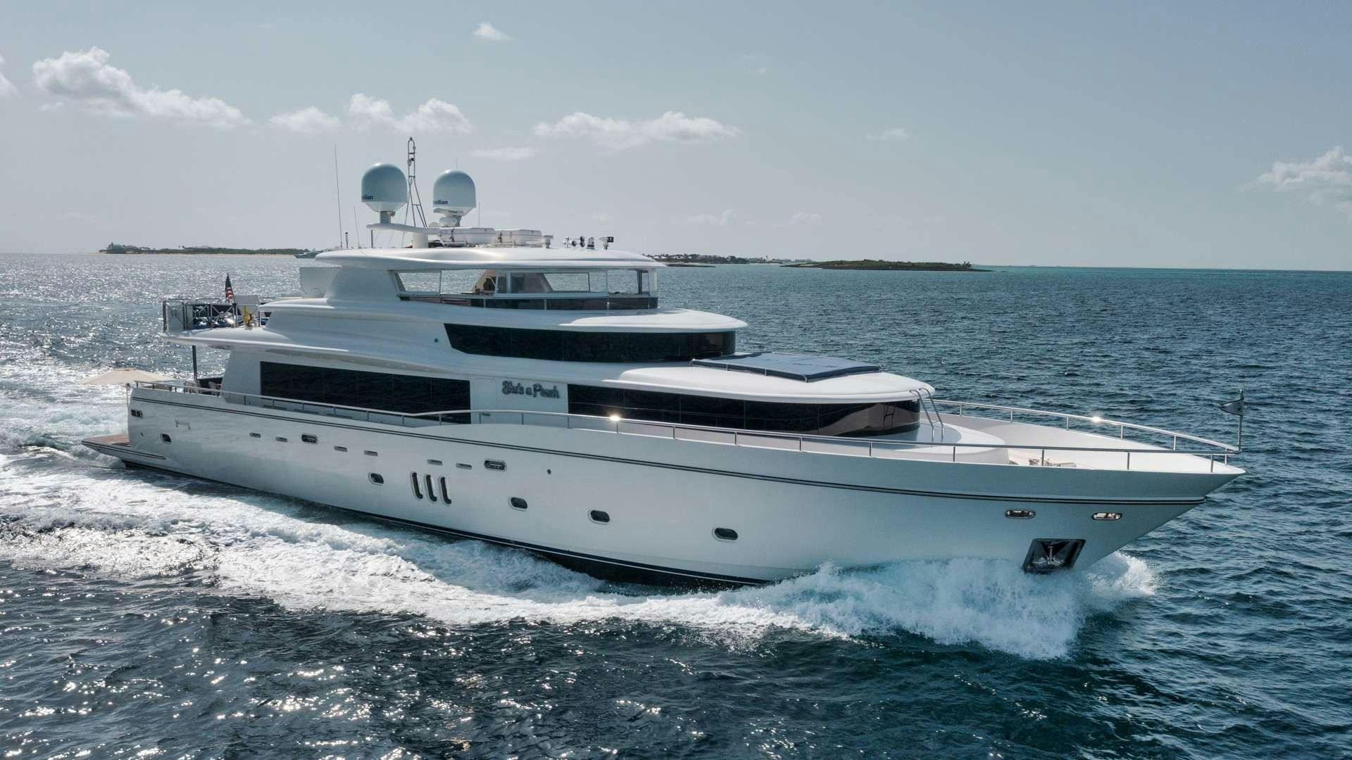 a white yacht on the water aboard SHE'S A PEACH Yacht for Charter