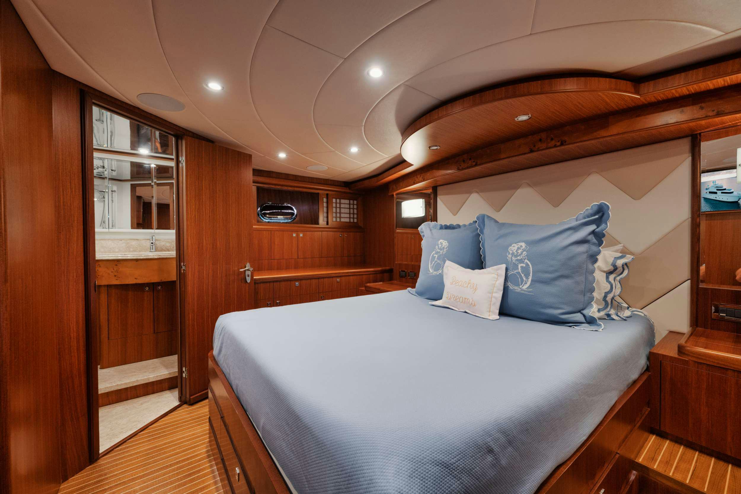 a bed in a cabin aboard SHE'S A PEACH Yacht for Charter