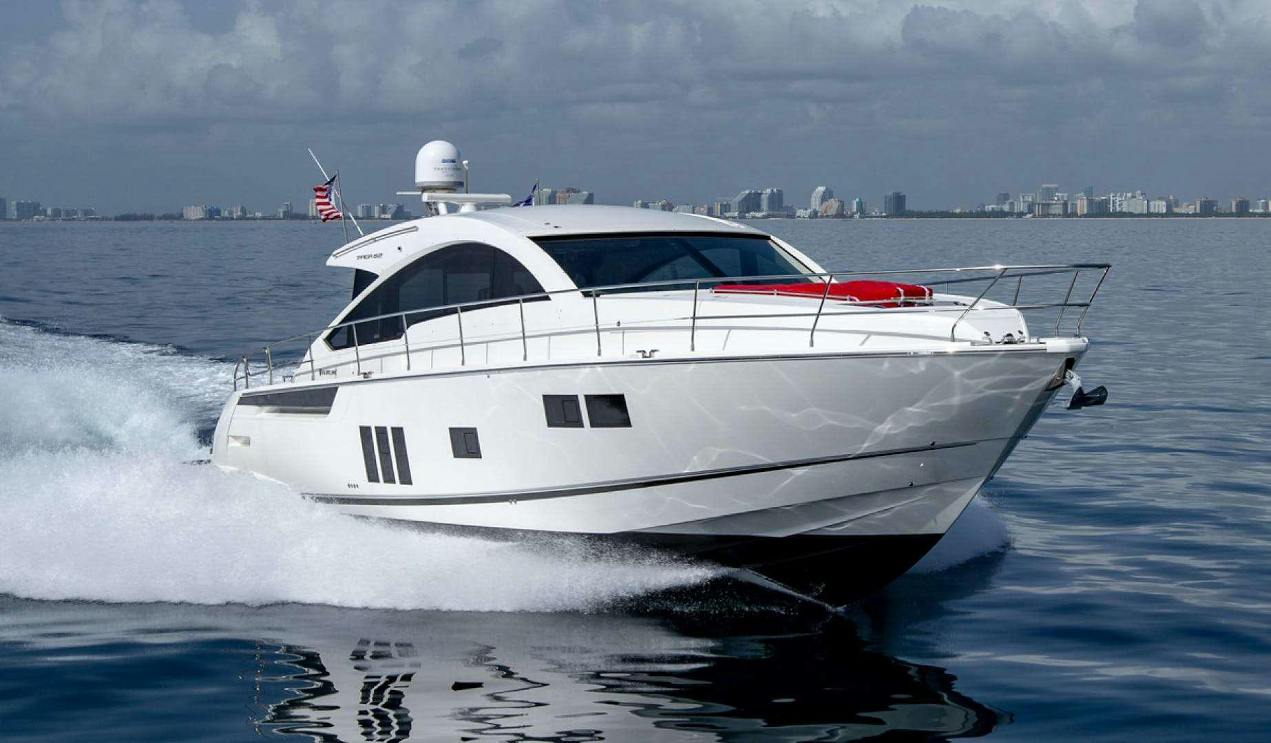 a white yacht on the water aboard MY GIRL Yacht for Charter