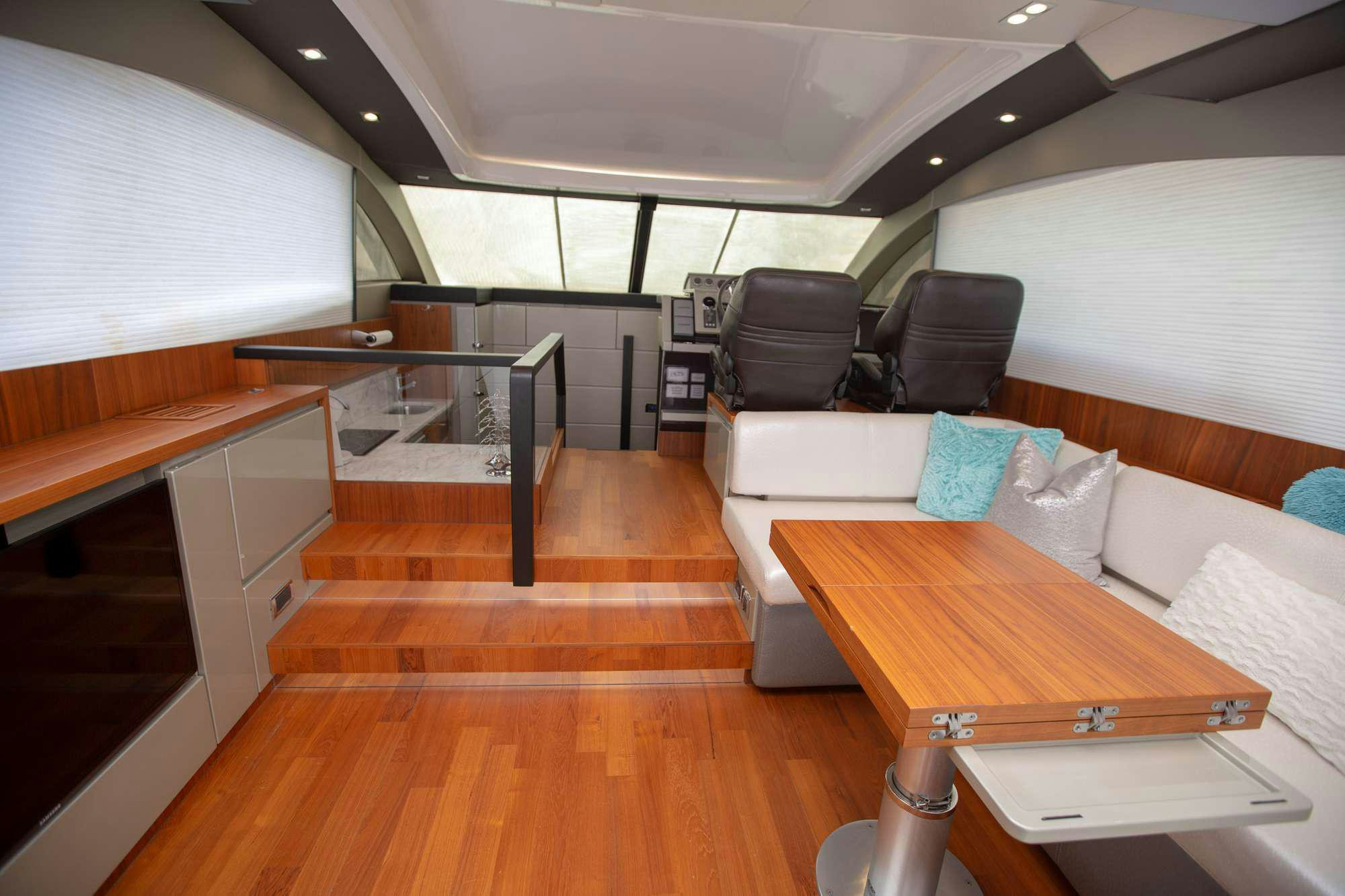a room with a couch and a table aboard MY GIRL Yacht for Charter