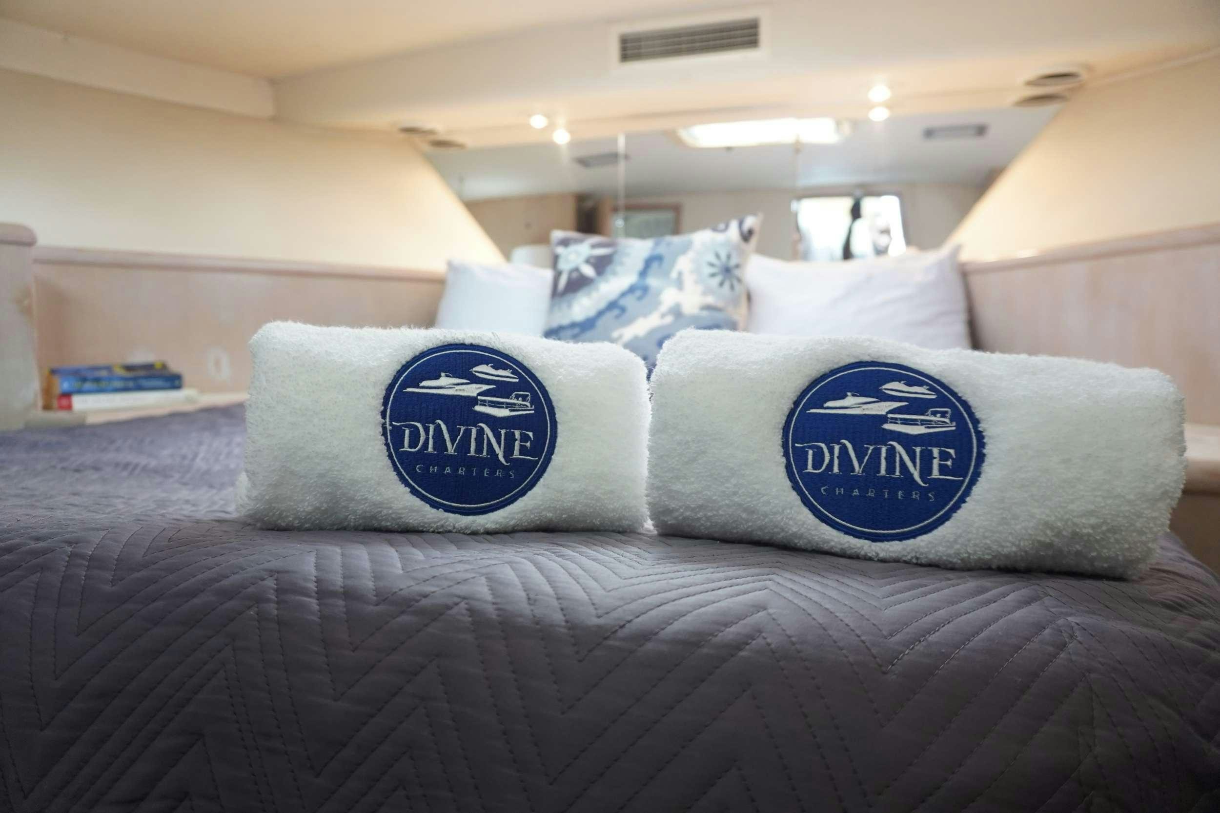 pillows on a bed aboard DIVINE Yacht for Charter