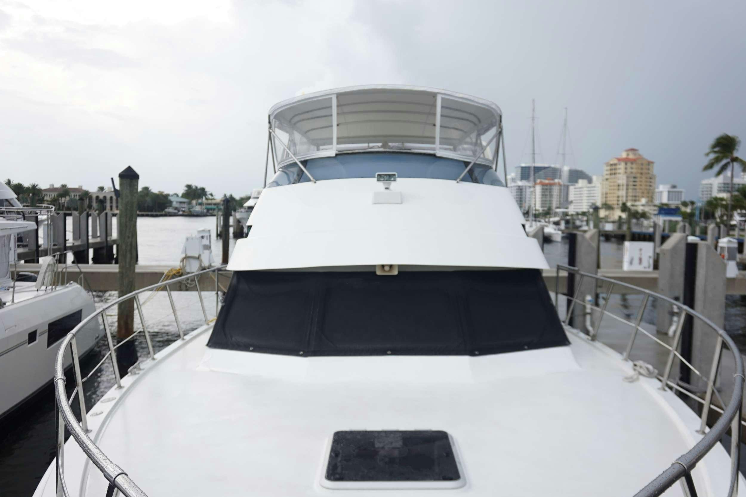 a boat on a dock aboard DIVINE Yacht for Charter