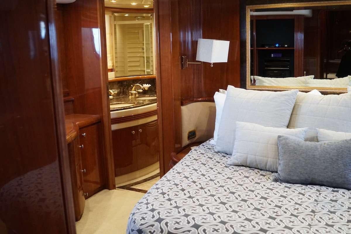 a bed in a room aboard AZURE Yacht for Charter