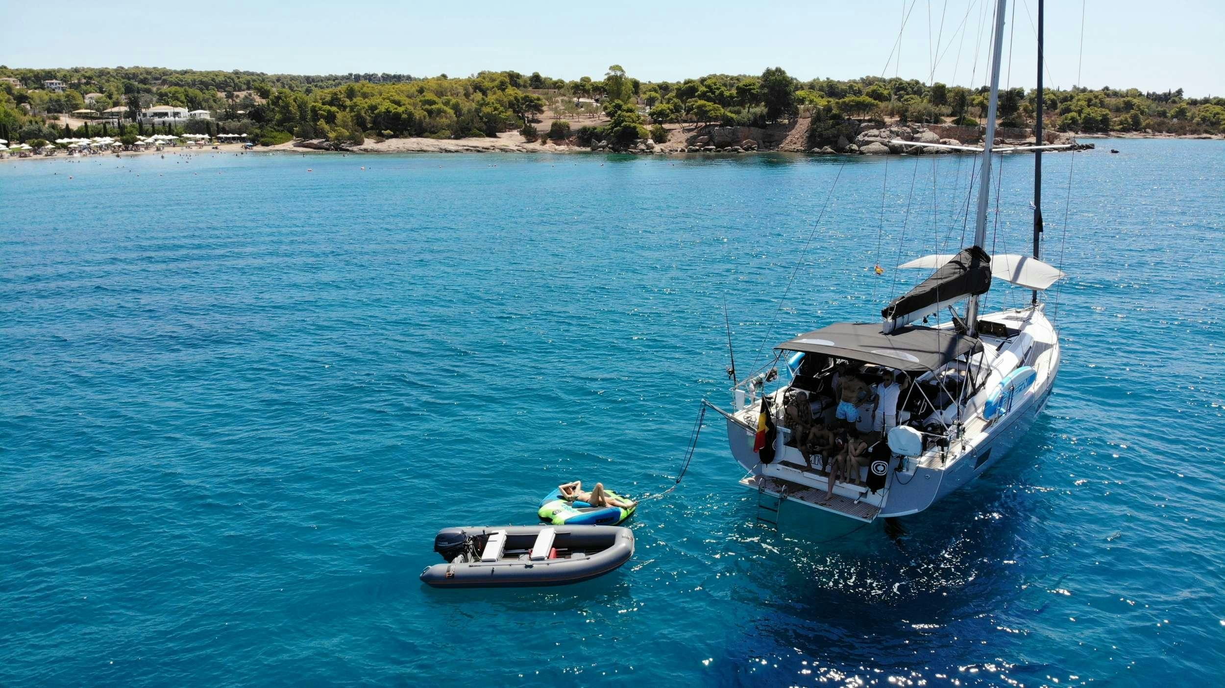 a boat sailing on the water aboard MIO SHI Yacht for Charter