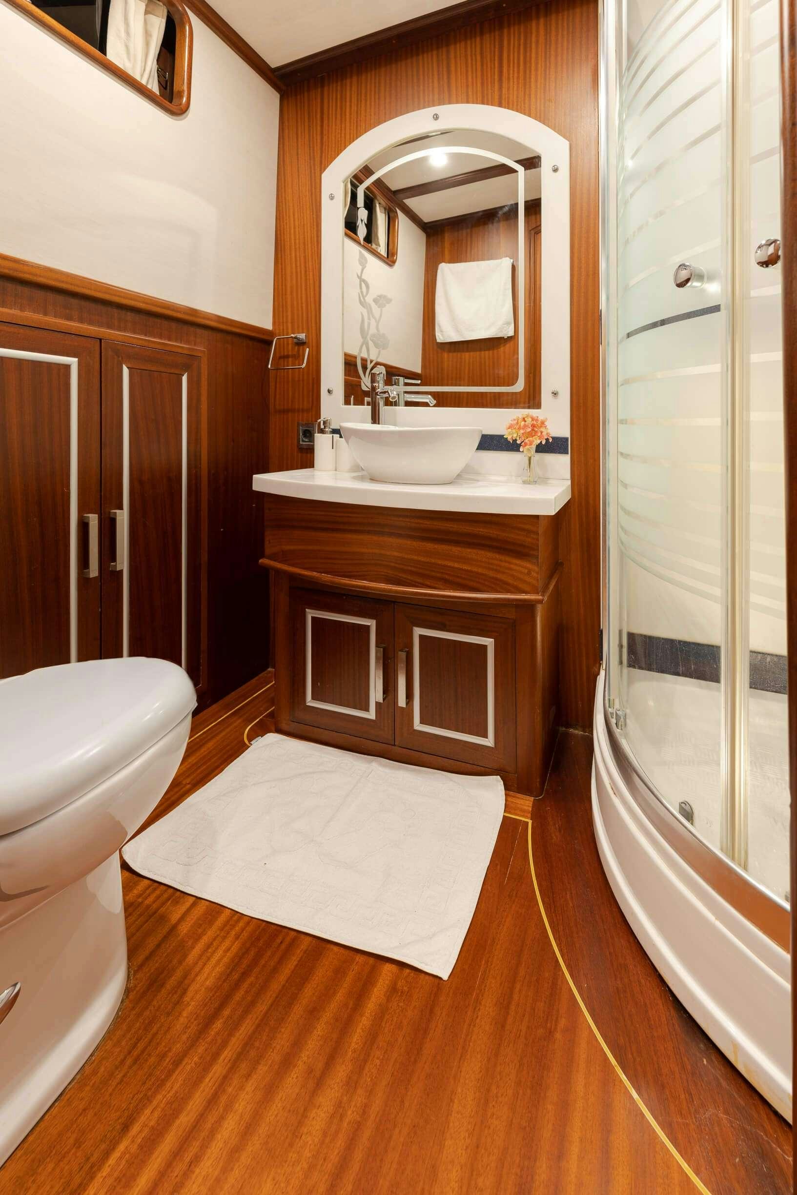 a bathroom with a sink and a toilet aboard ESTRELLA DE MAR Yacht for Charter