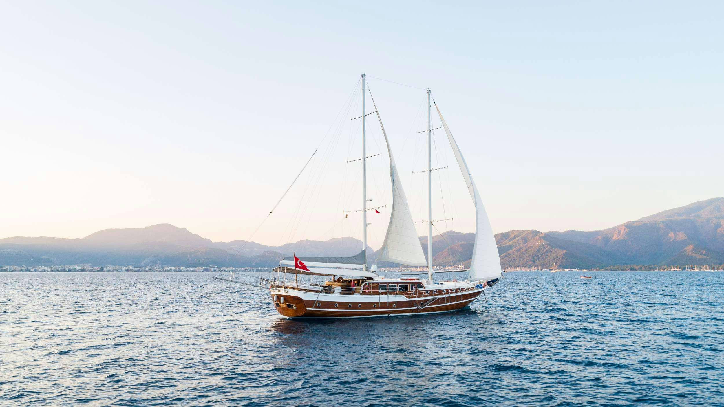 a sailboat in the water aboard S NUR TAYLAN Yacht for Charter