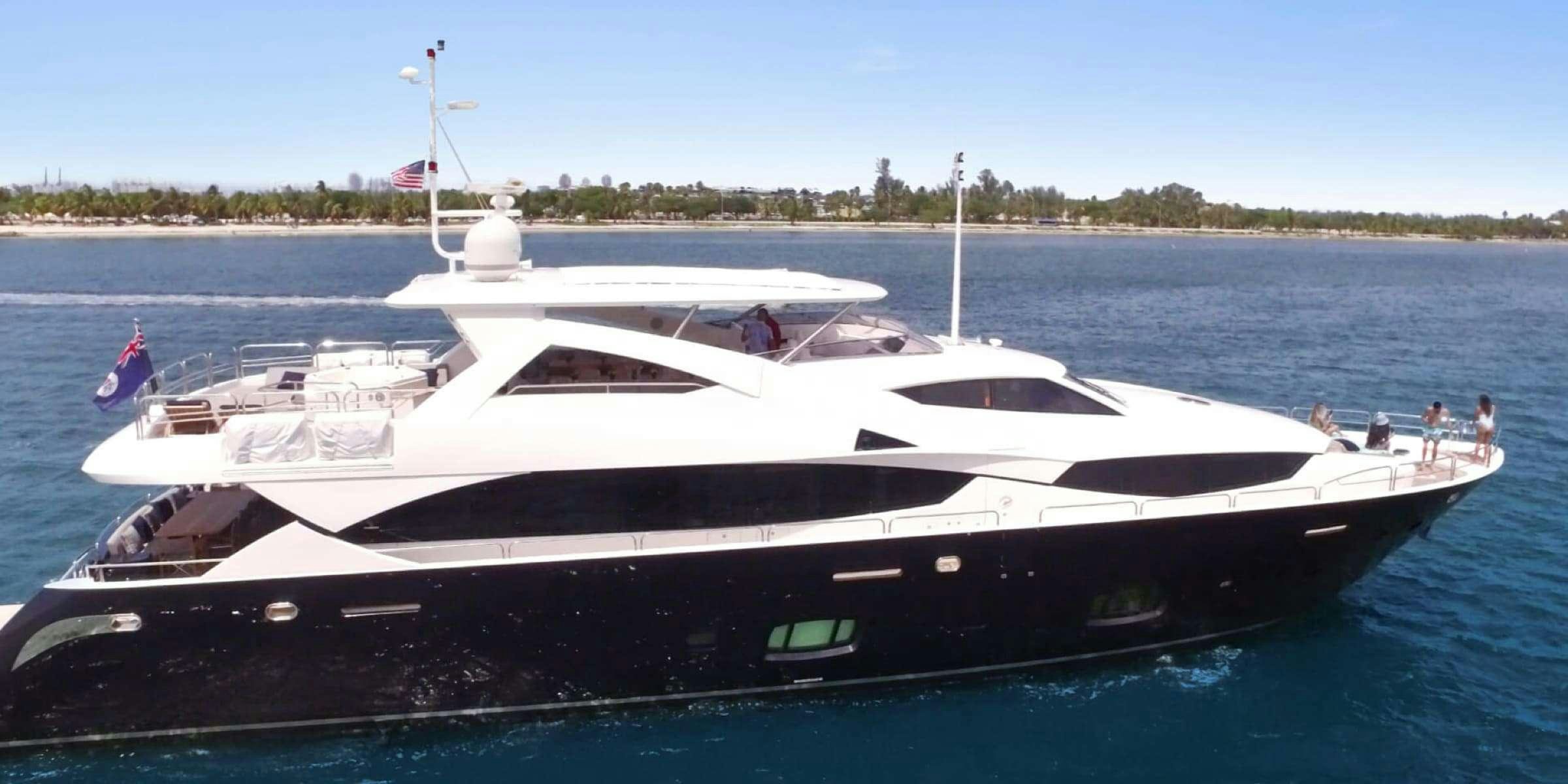 a white yacht on the water aboard viva la vida Yacht for Charter