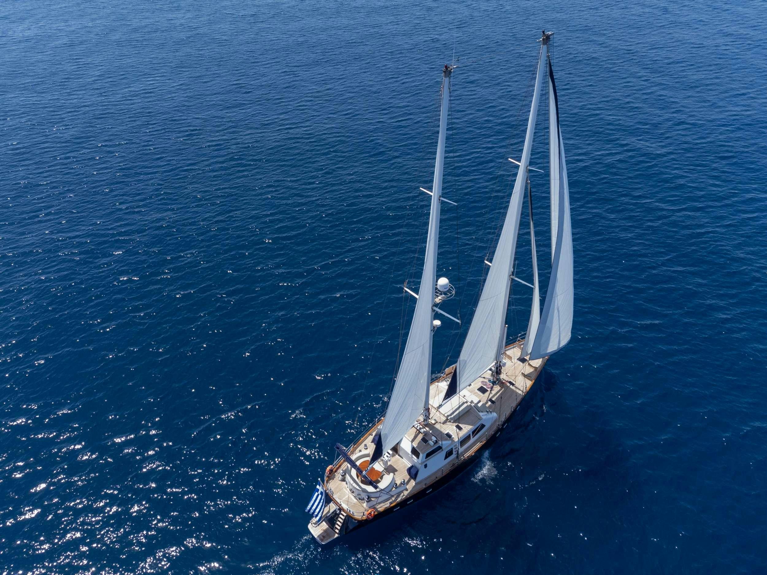 a boat sailing on the water aboard SPIRIT L Yacht for Charter