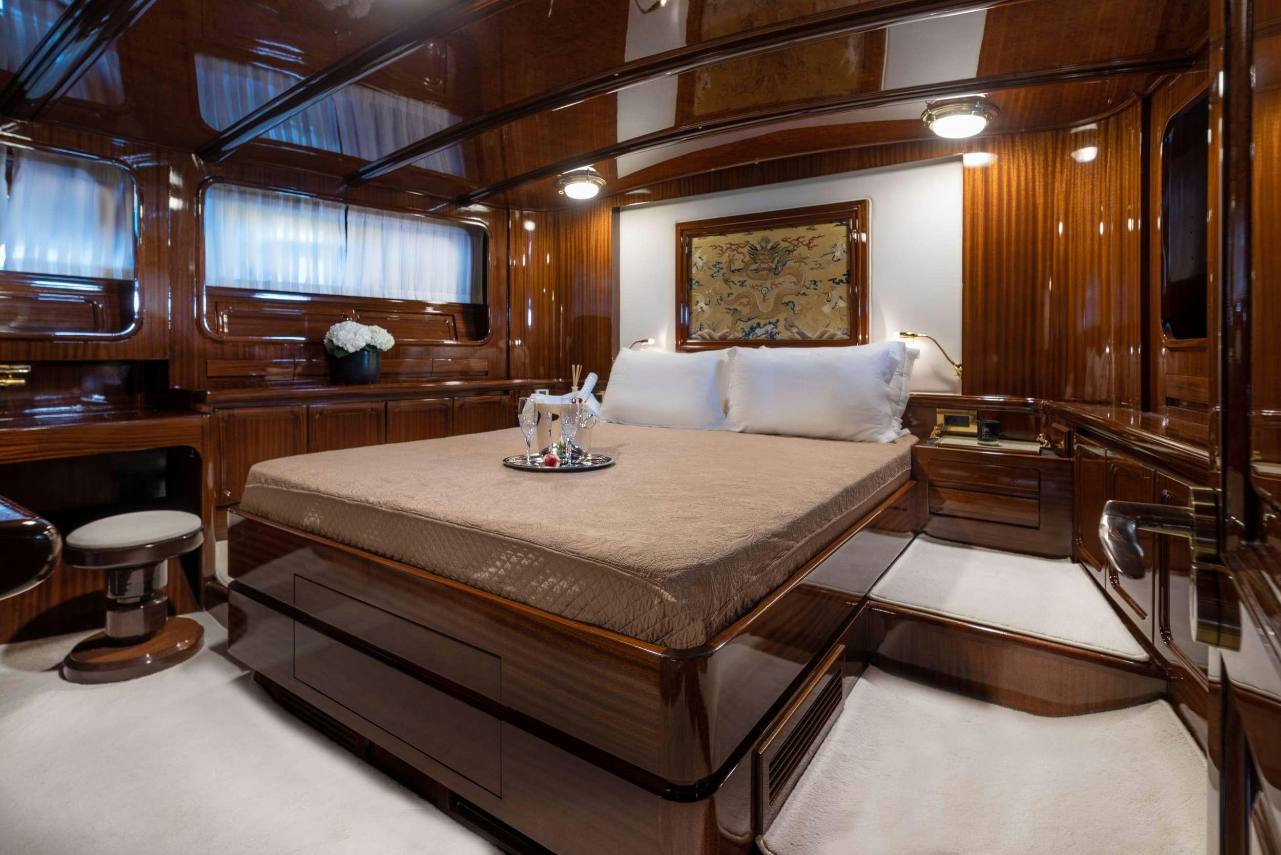 a large bed in a room aboard SPIRIT L Yacht for Charter
