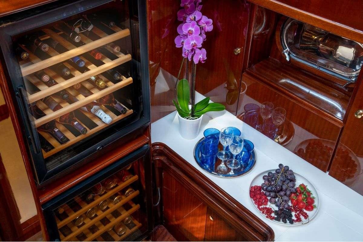 a table with food and drinks aboard SPIRIT L Yacht for Charter