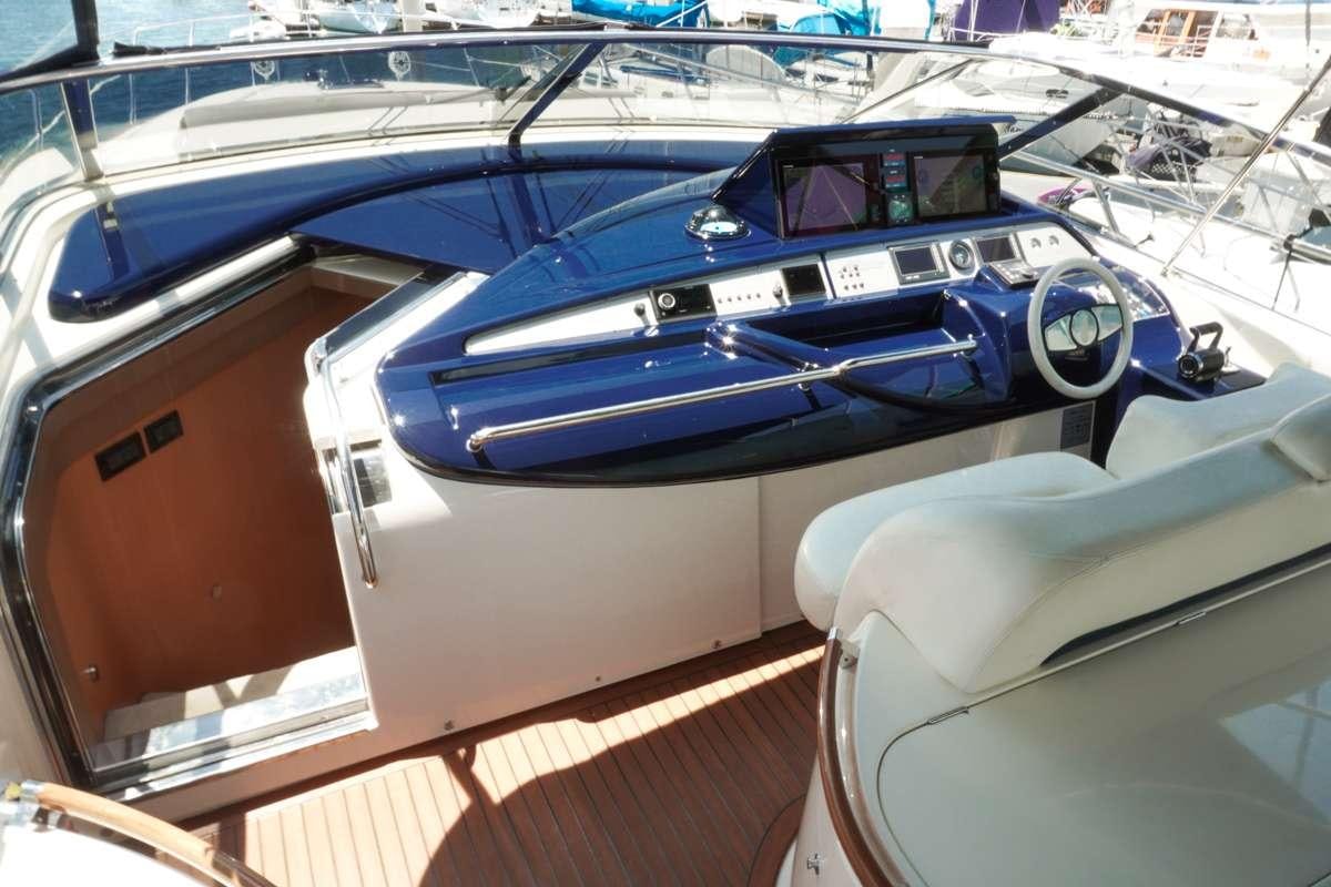 the interior of a car aboard EXPRESSO Yacht for Charter