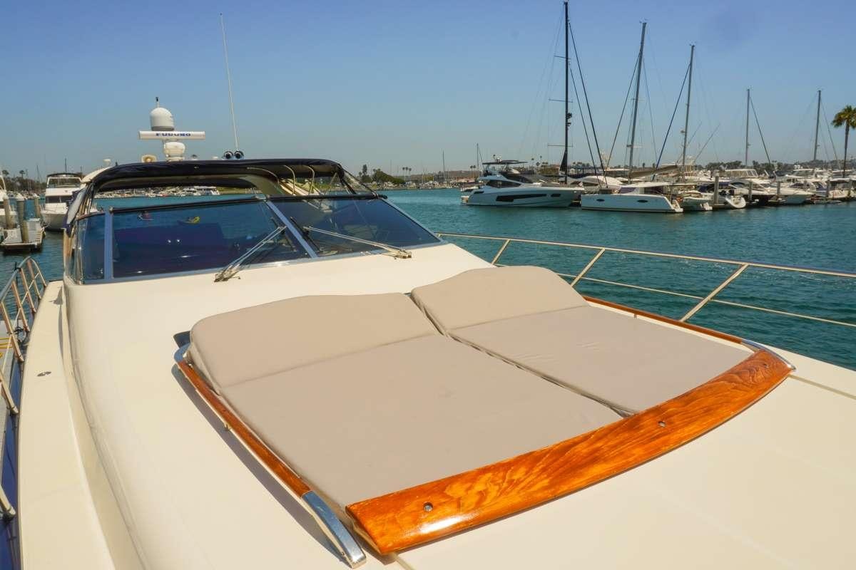 a boat in a harbor aboard EXPRESSO Yacht for Charter