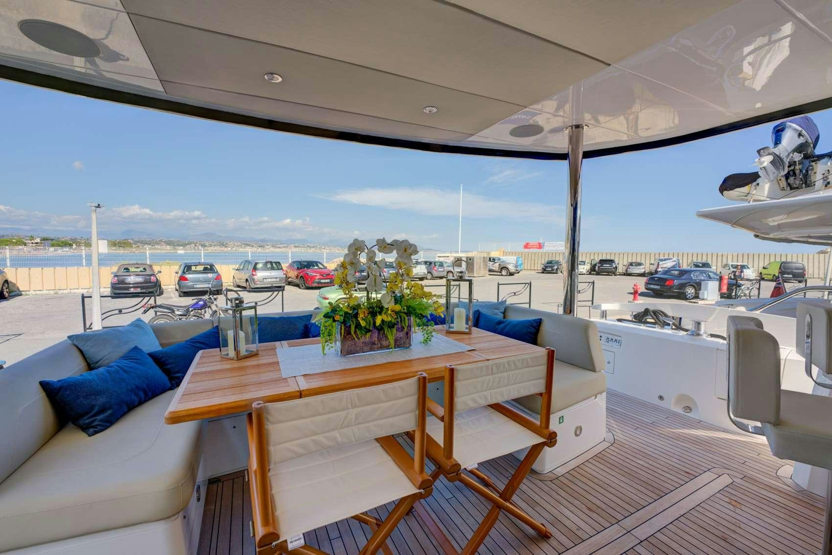 a table on a deck aboard MIKEL ANGELO Yacht for Charter