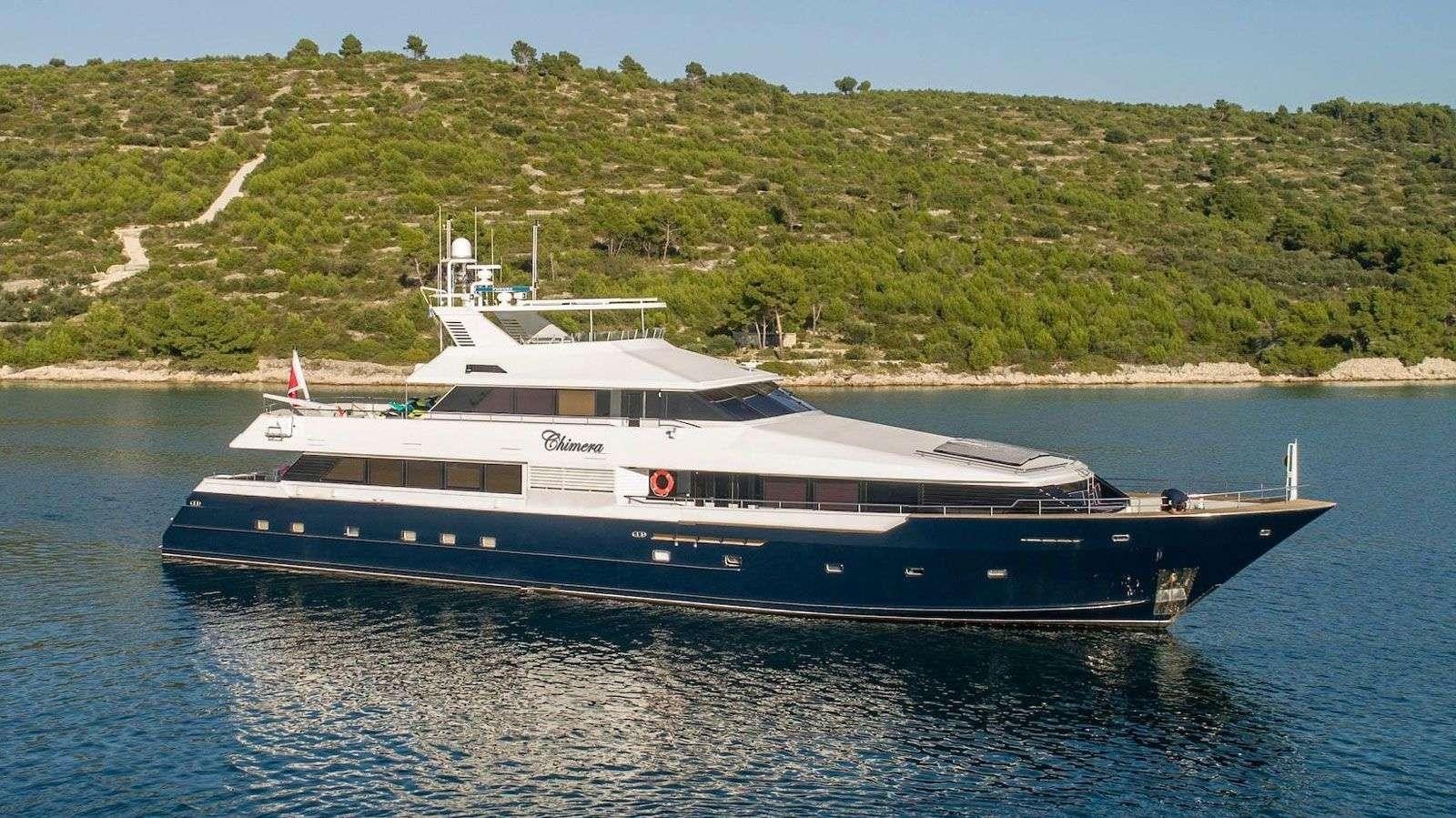 a large white boat on the water aboard QUANTUM Yacht for Charter