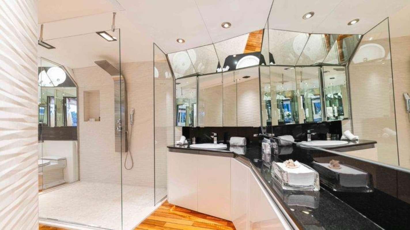 a kitchen with a large mirror aboard QUANTUM Yacht for Charter