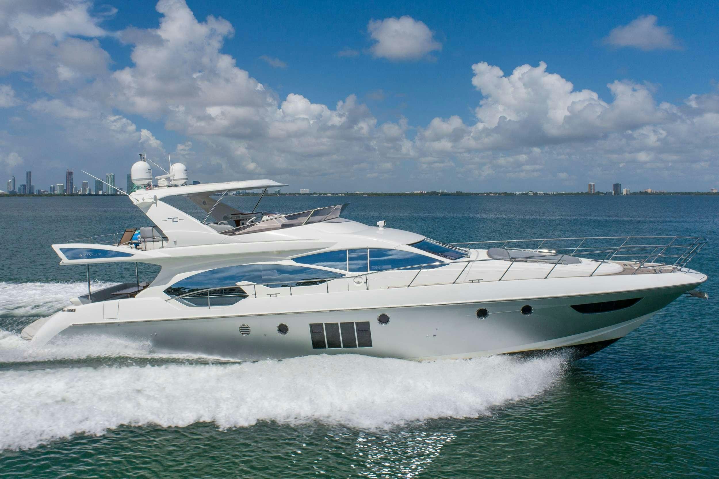 a white yacht in the water aboard DAYS LIKE THIS Yacht for Charter