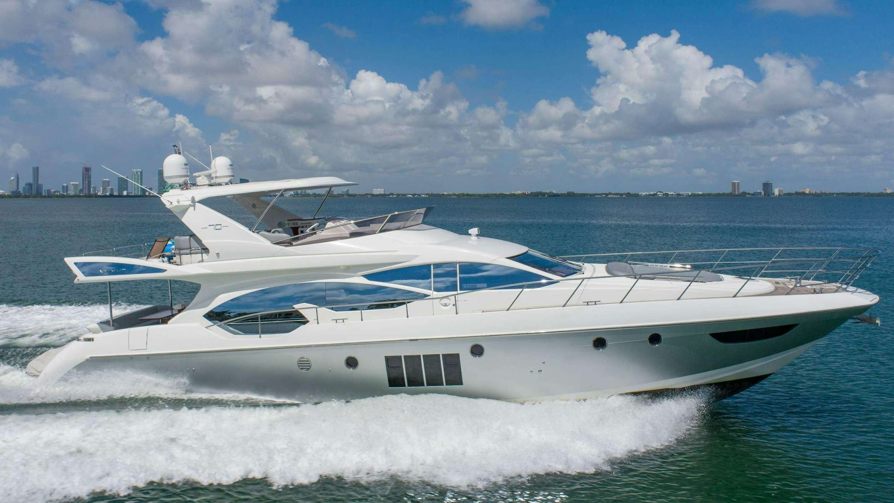 a white yacht in the water aboard DAYS LIKE THIS Yacht for Charter