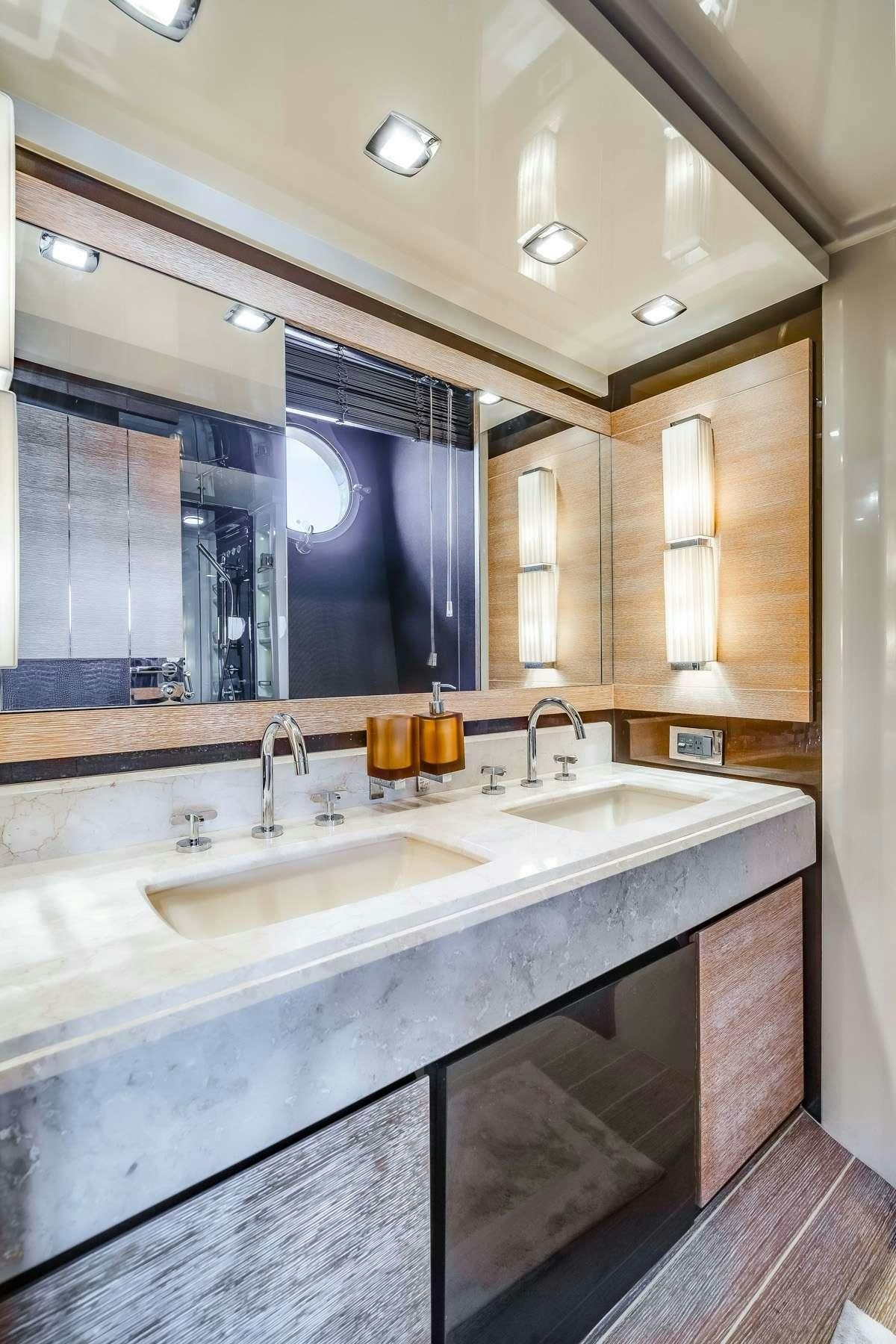 a bathroom with two sinks aboard DAYS LIKE THIS Yacht for Charter