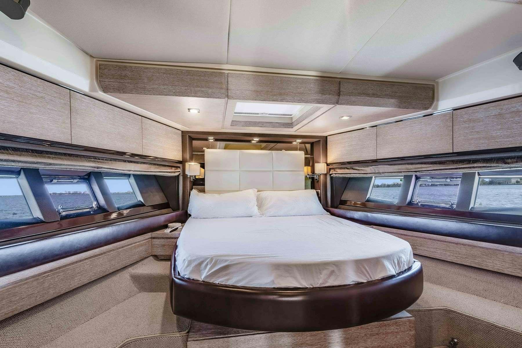 a room with a couple of beds aboard DAYS LIKE THIS Yacht for Charter