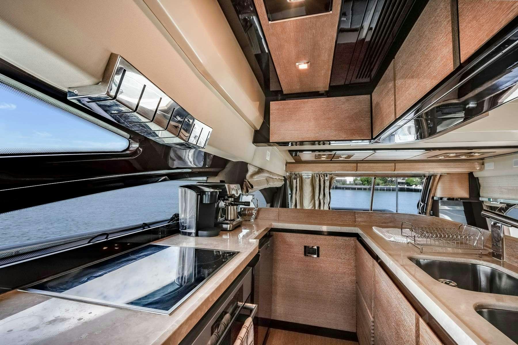 a kitchen with a large oven aboard DAYS LIKE THIS Yacht for Charter