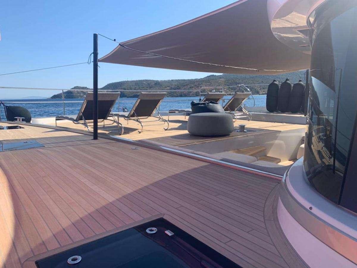 a deck with a large building and a large body of water aboard JUST MARIE 2 Yacht for Charter