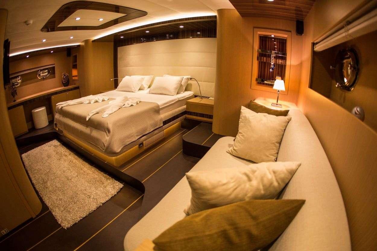 a room with two beds aboard LE PIETRE Yacht for Charter