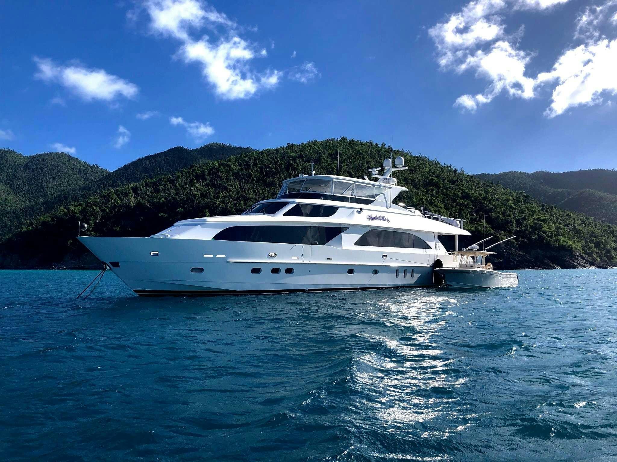 a white yacht in the water aboard CYNDERELLA Yacht for Charter
