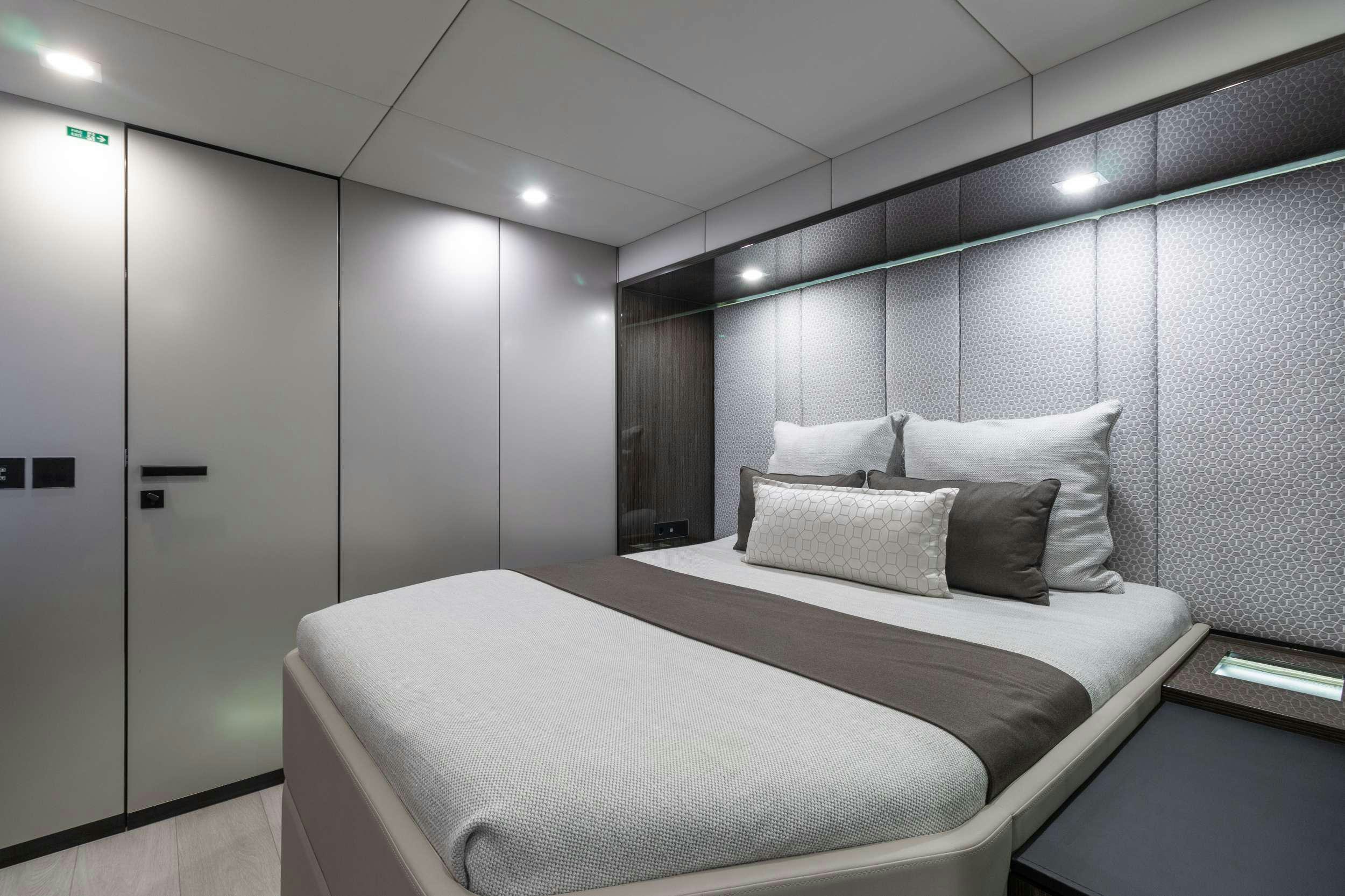 a bed in a room aboard OCEAN VIBES Yacht for Charter