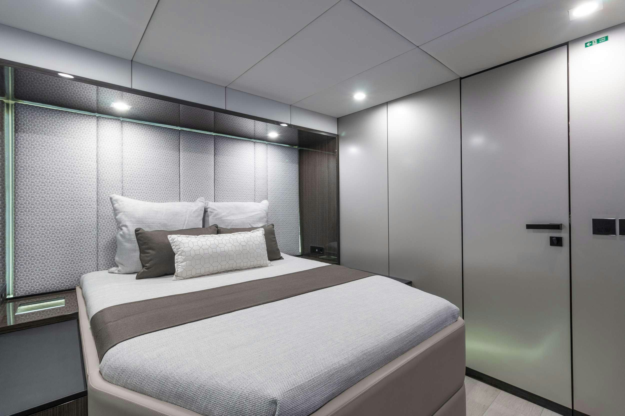 a bed in a room aboard OCEAN VIBES Yacht for Charter