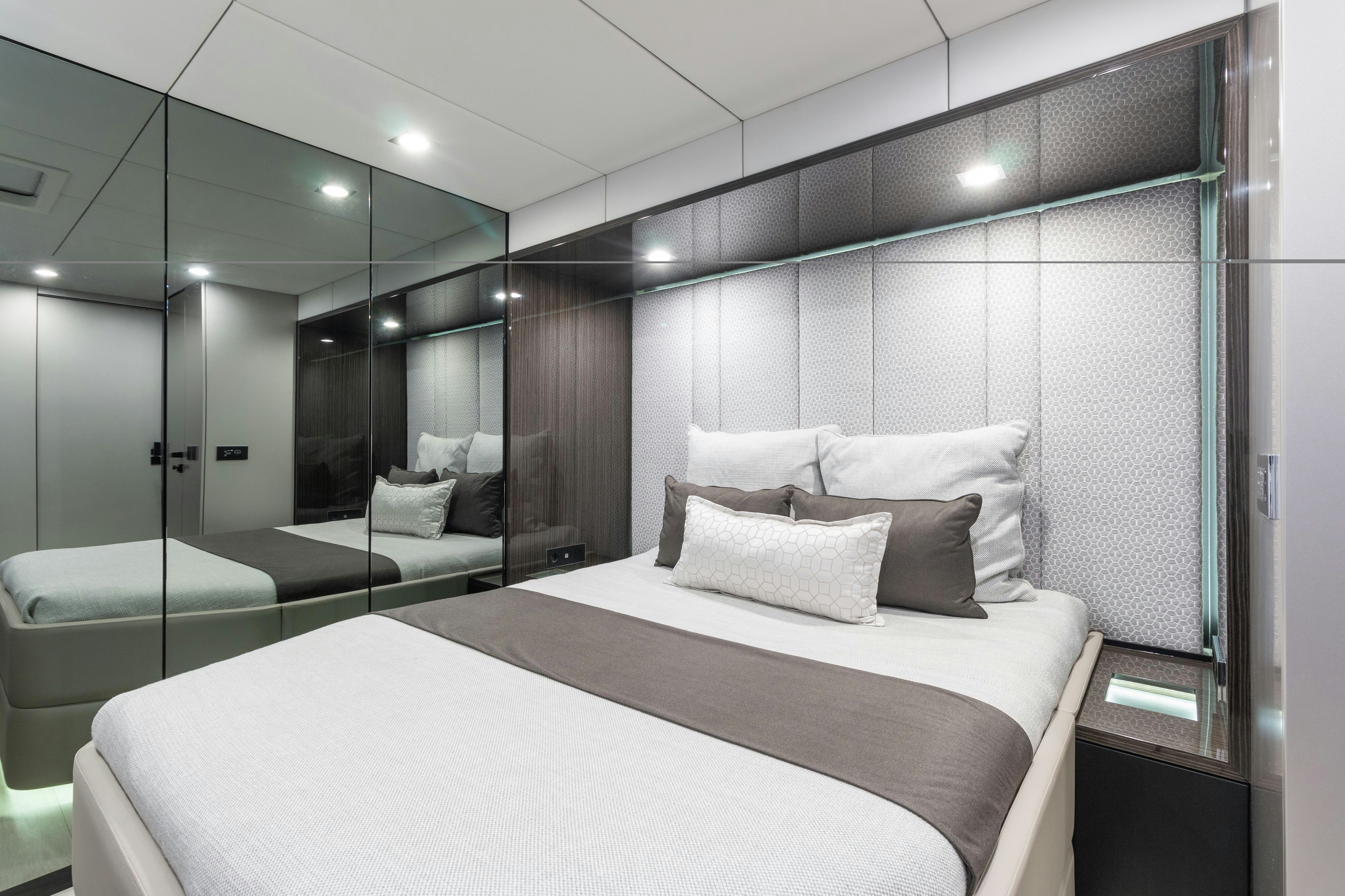 a bed in a room aboard OCEAN VIBES Yacht for Charter