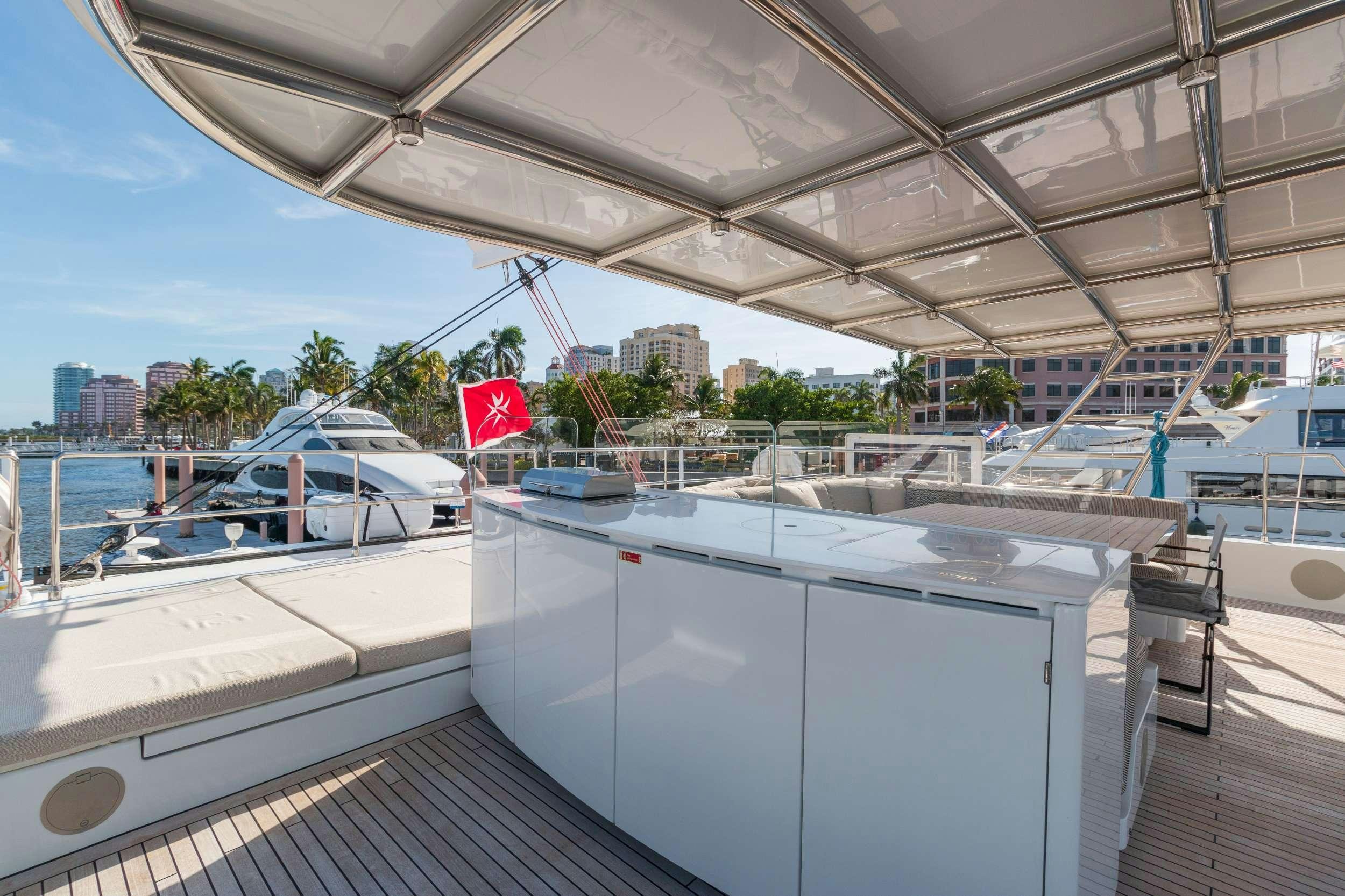 a boat dock with boats aboard OCEAN VIBES Yacht for Charter