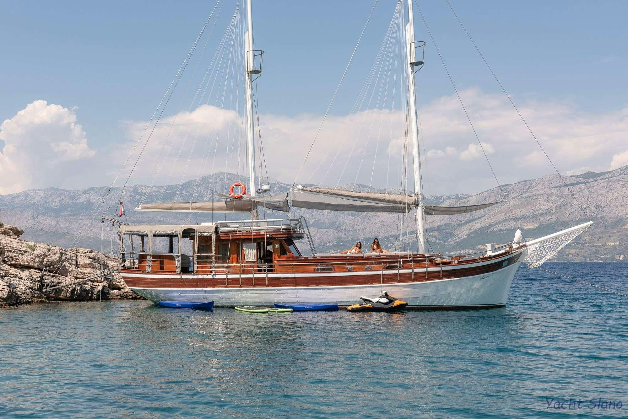 a boat on the water aboard SLANO Yacht for Charter