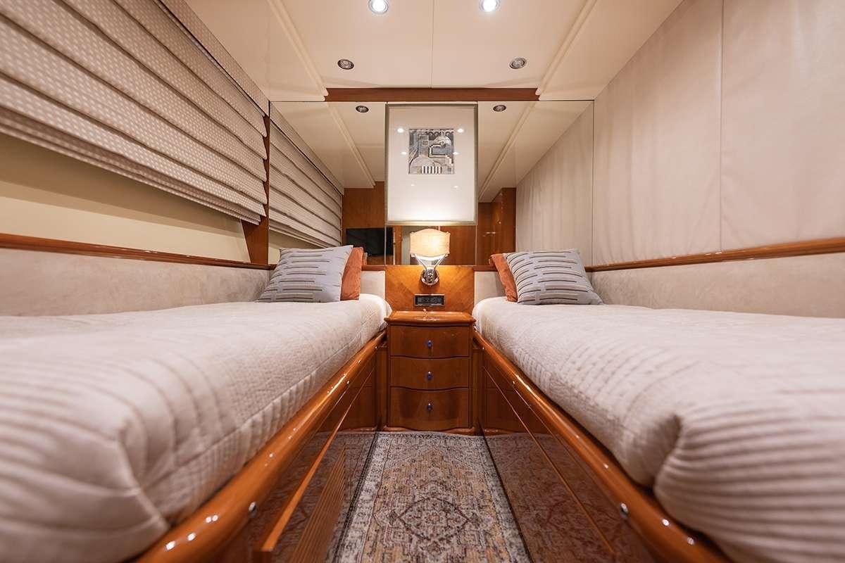 a room with two beds aboard ENDLESS SUN Yacht for Charter