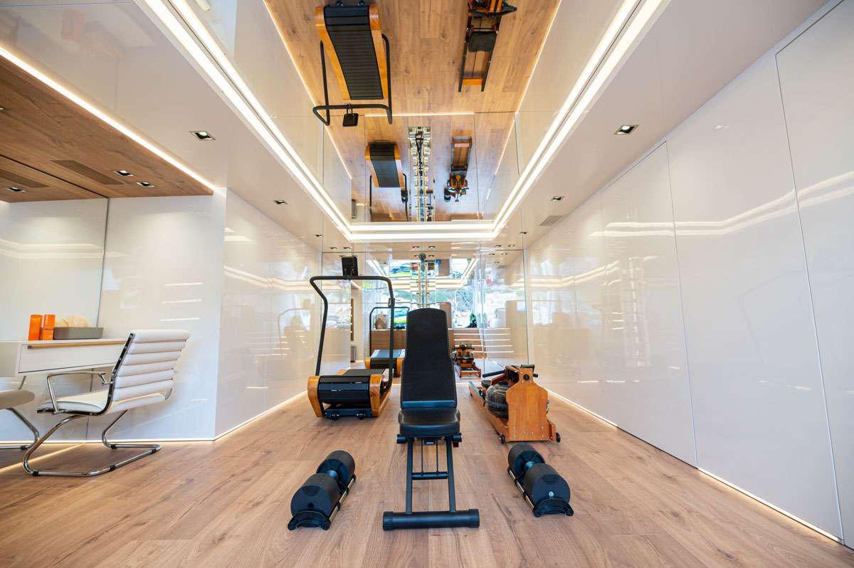 a room with a chair and a table and a chair aboard BARENTS Yacht for Charter