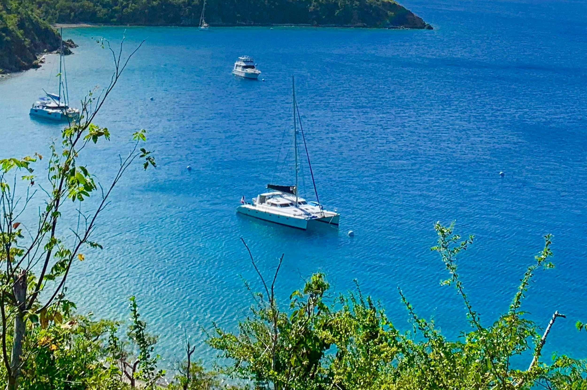 a boat sailing in the water aboard Genesis II Yacht for Charter