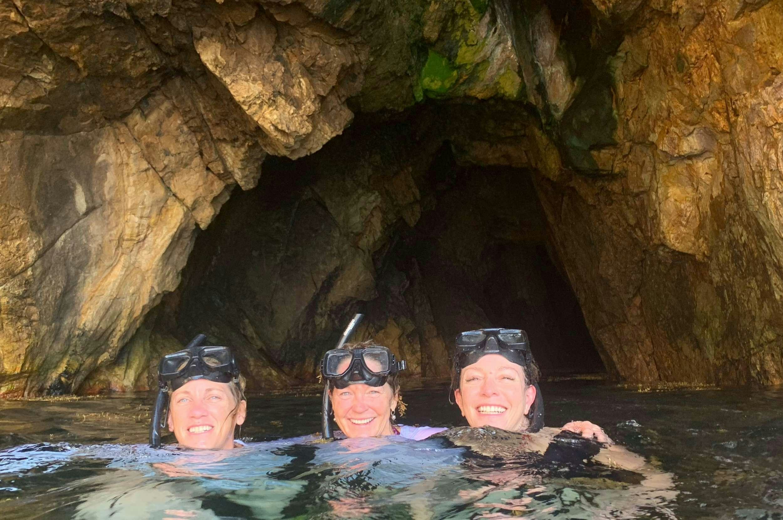 a group of people in a pool aboard Genesis II Yacht for Charter