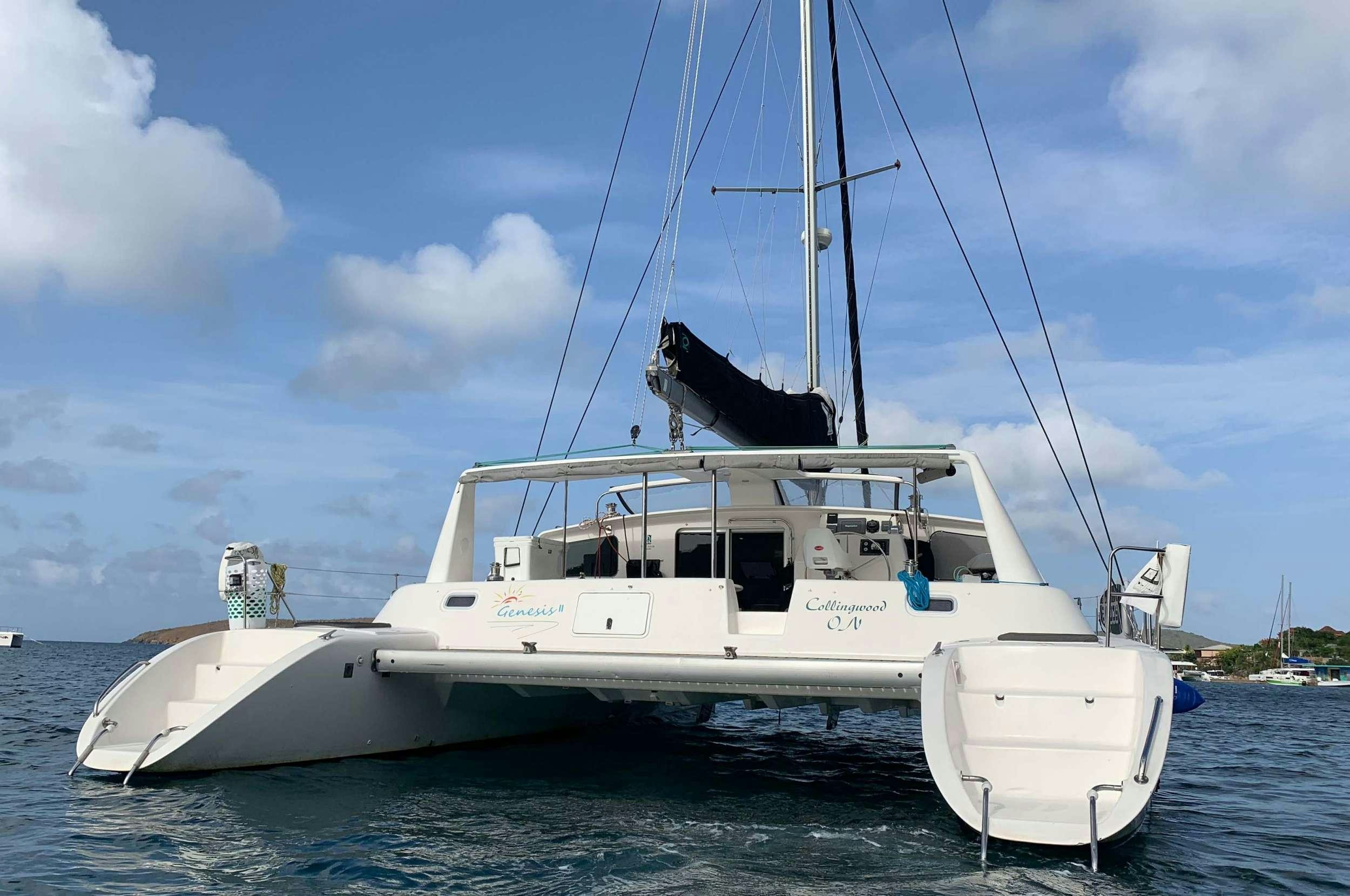 a cat on a boat aboard Genesis II Yacht for Charter