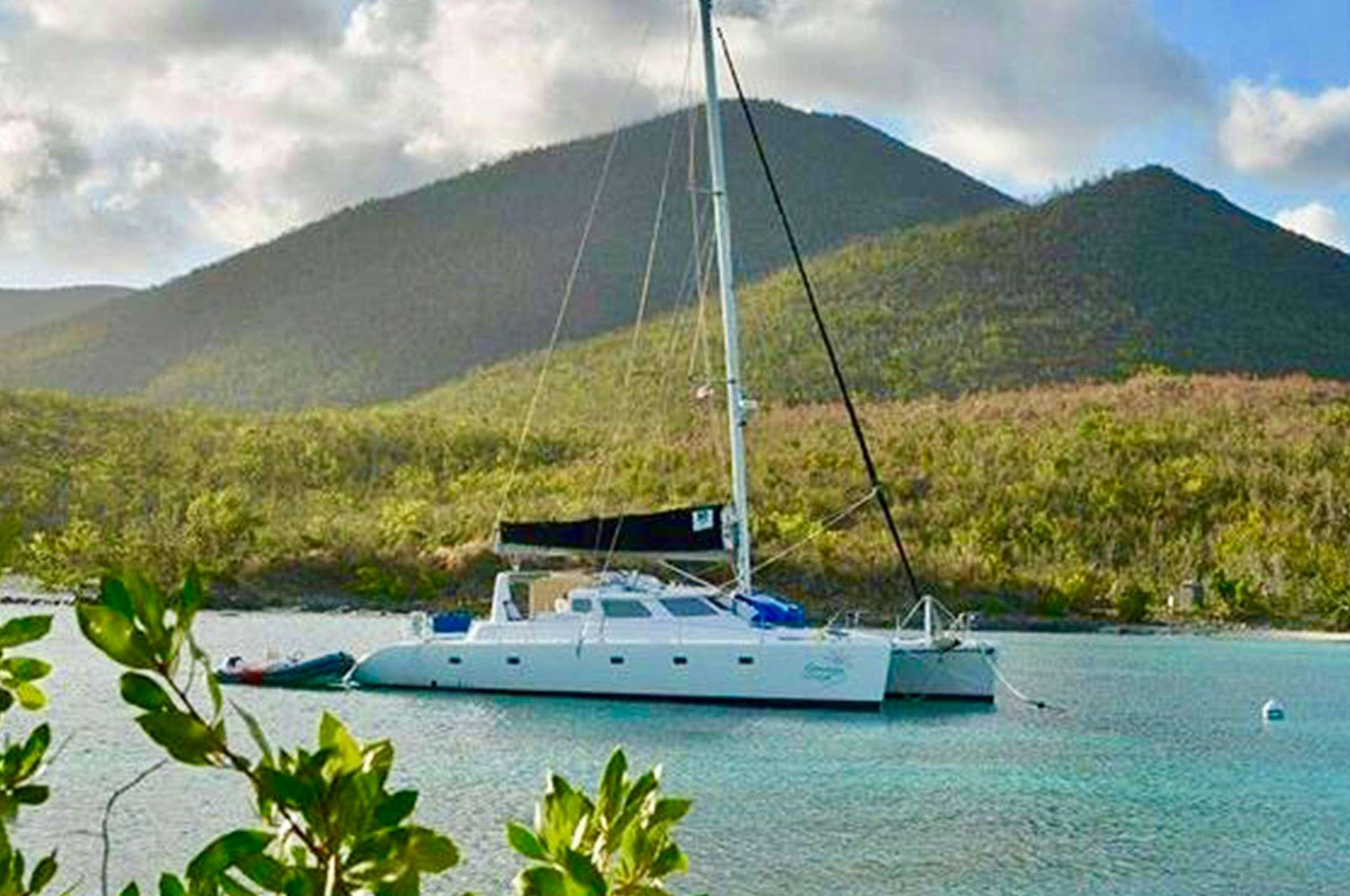 a boat sailing in the water aboard Genesis II Yacht for Charter
