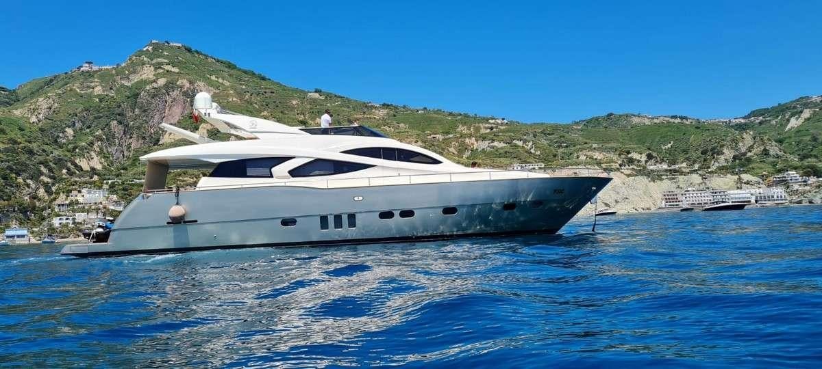 a white yacht in the water aboard JOY Yacht for Charter