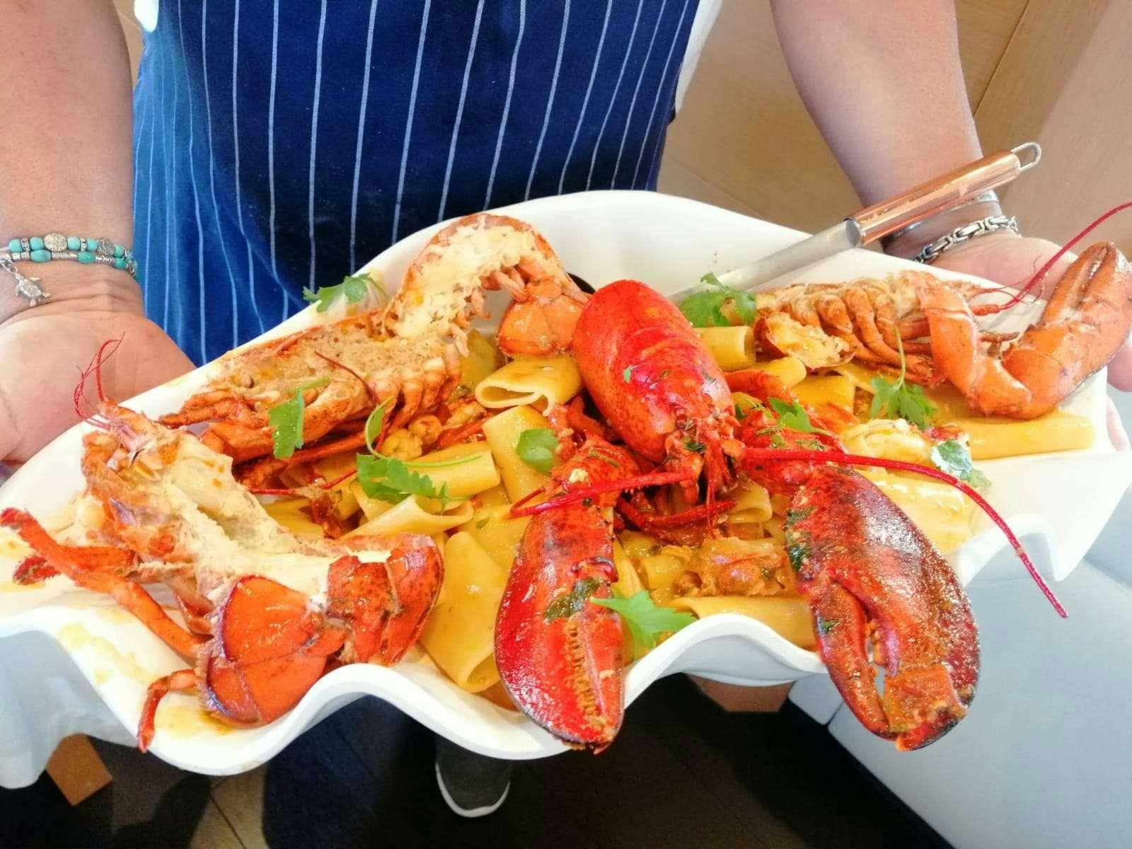 a plate of food aboard JOY Yacht for Charter