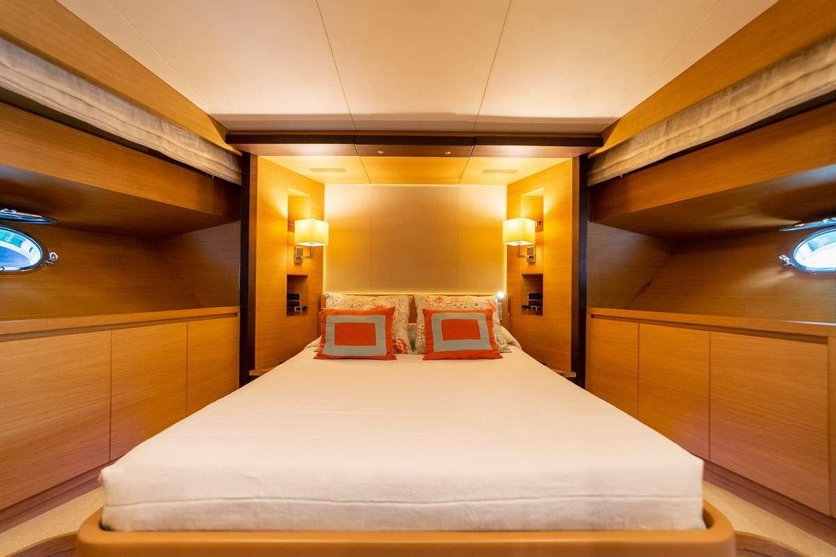 a bed in a room aboard MISS CAROLINA Yacht for Charter