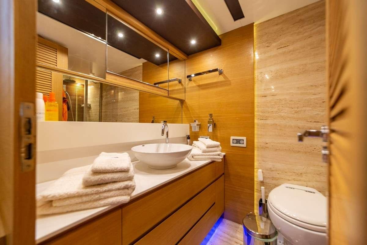 a bathroom with a sink and a toilet aboard MISS CAROLINA Yacht for Charter