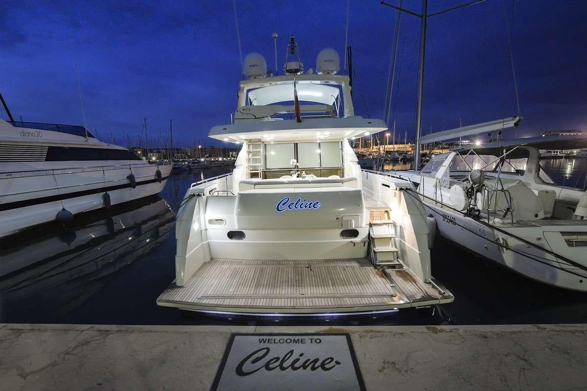 a group of boats are parked in a dock aboard Celine Yacht for Charter