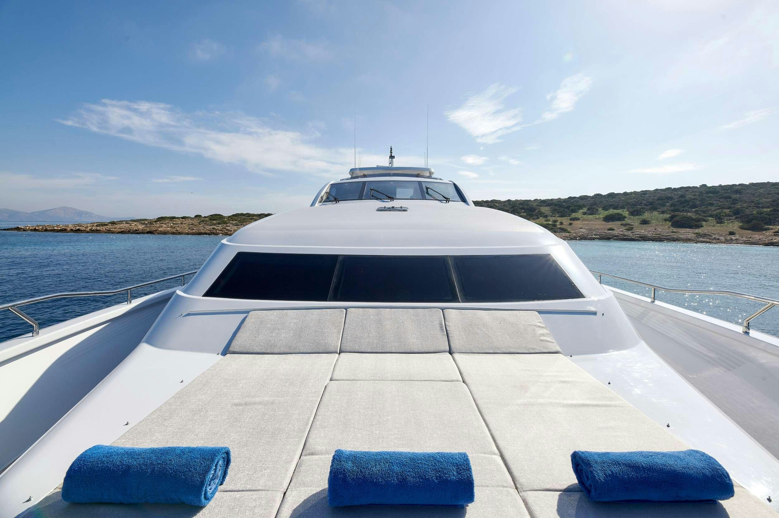 a boat on a body of water aboard HAKUNA MATATA Yacht for Charter