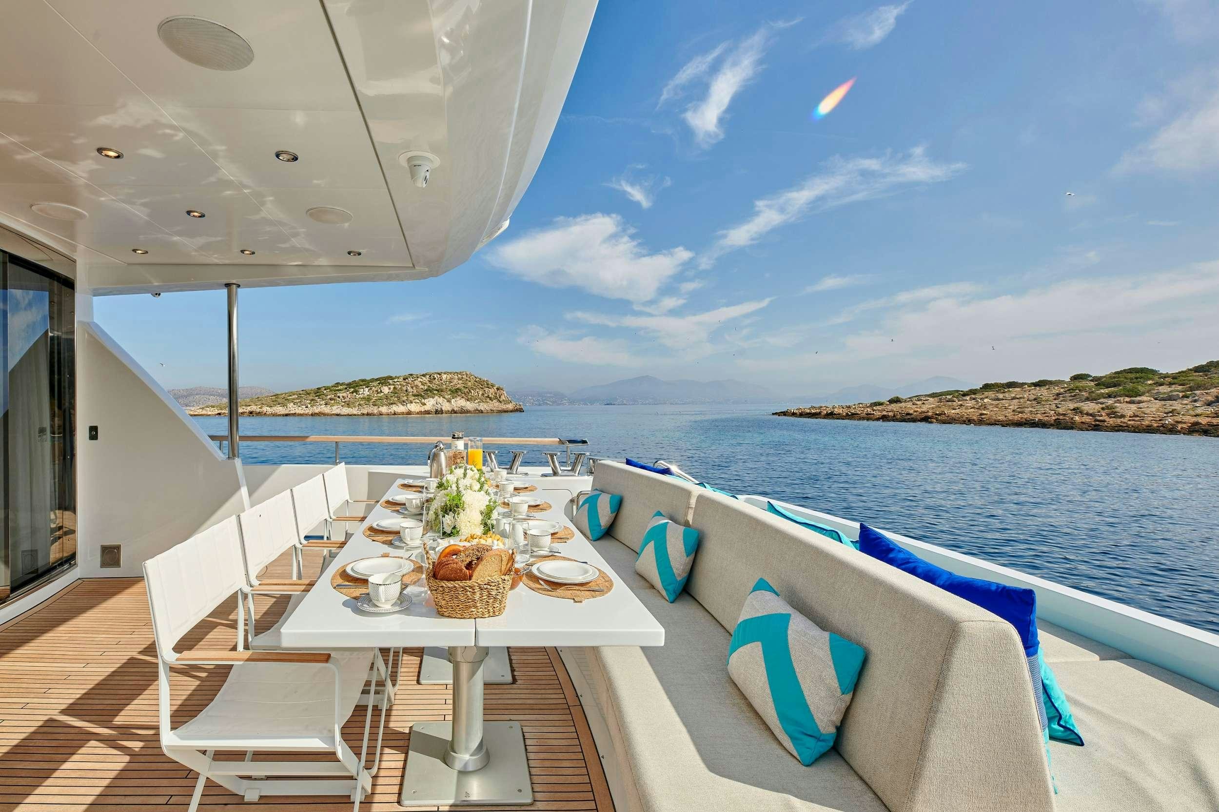 a table on a boat aboard HAKUNA MATATA Yacht for Charter
