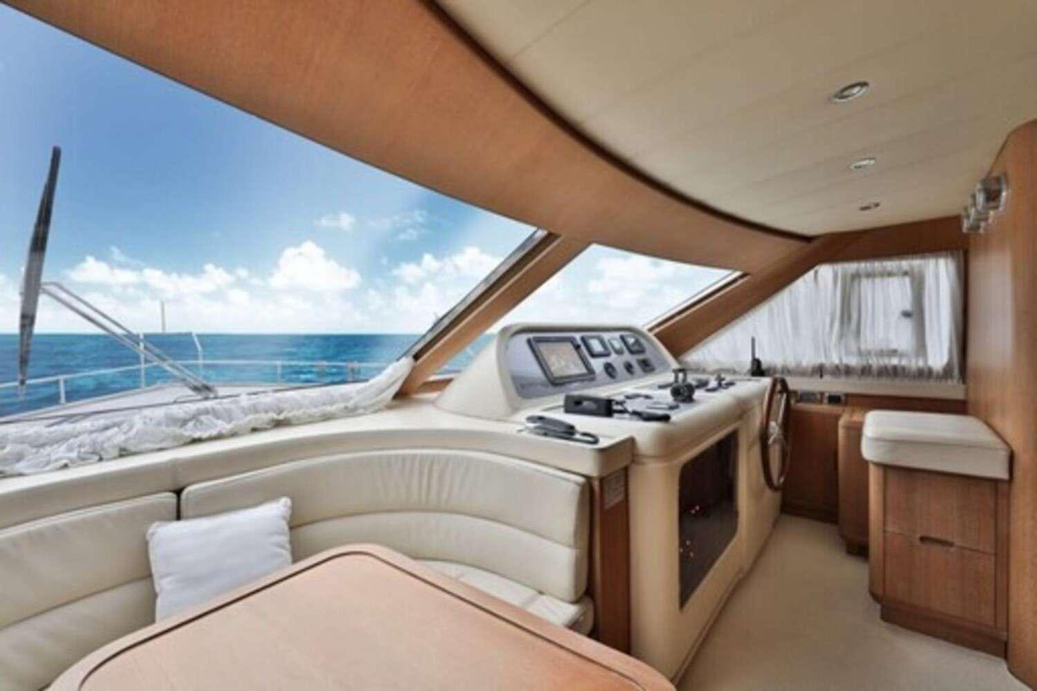 a boat with a bed and a desk in it aboard RESILIENCE Yacht for Charter