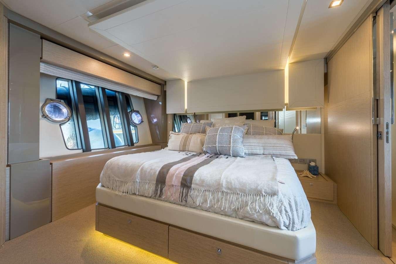 a bedroom with a bed aboard g5 Yacht for Charter