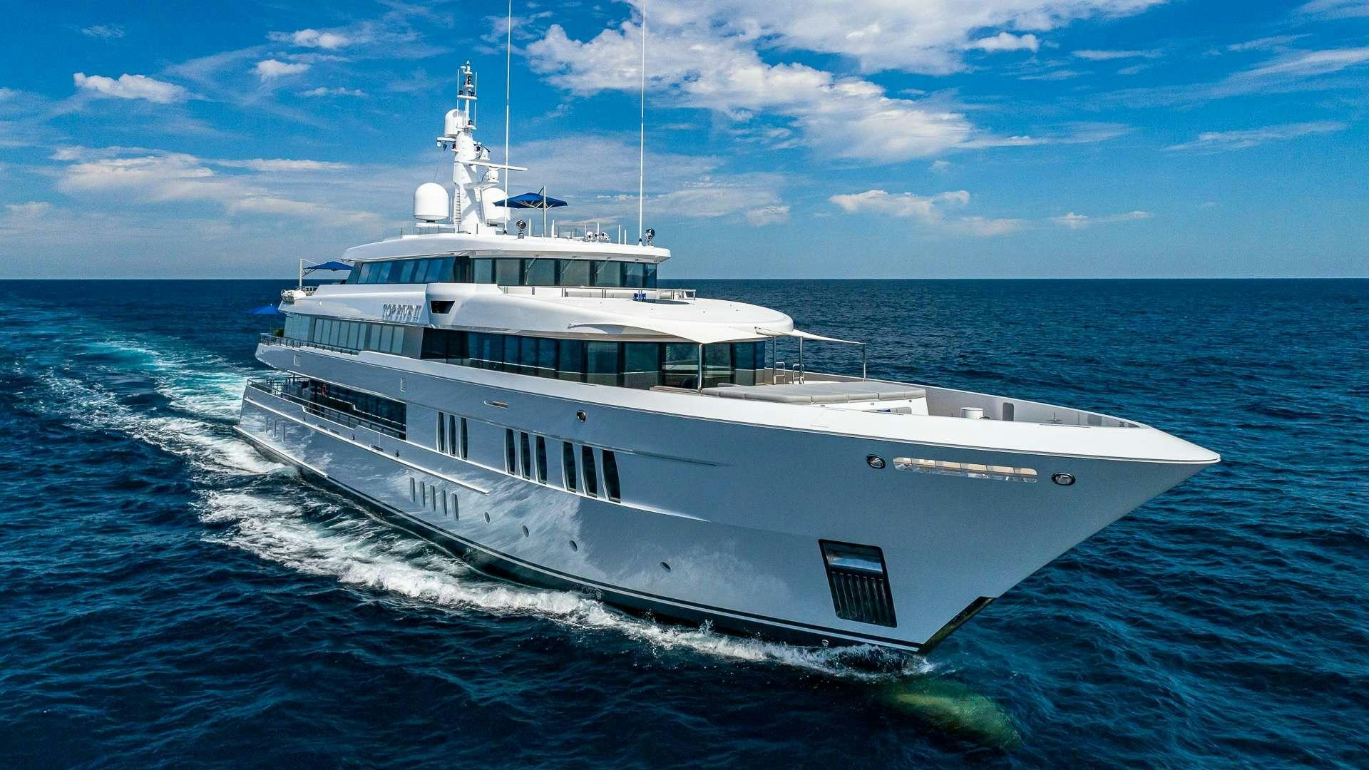 a white yacht on water aboard TOP FIVE II Yacht for Charter