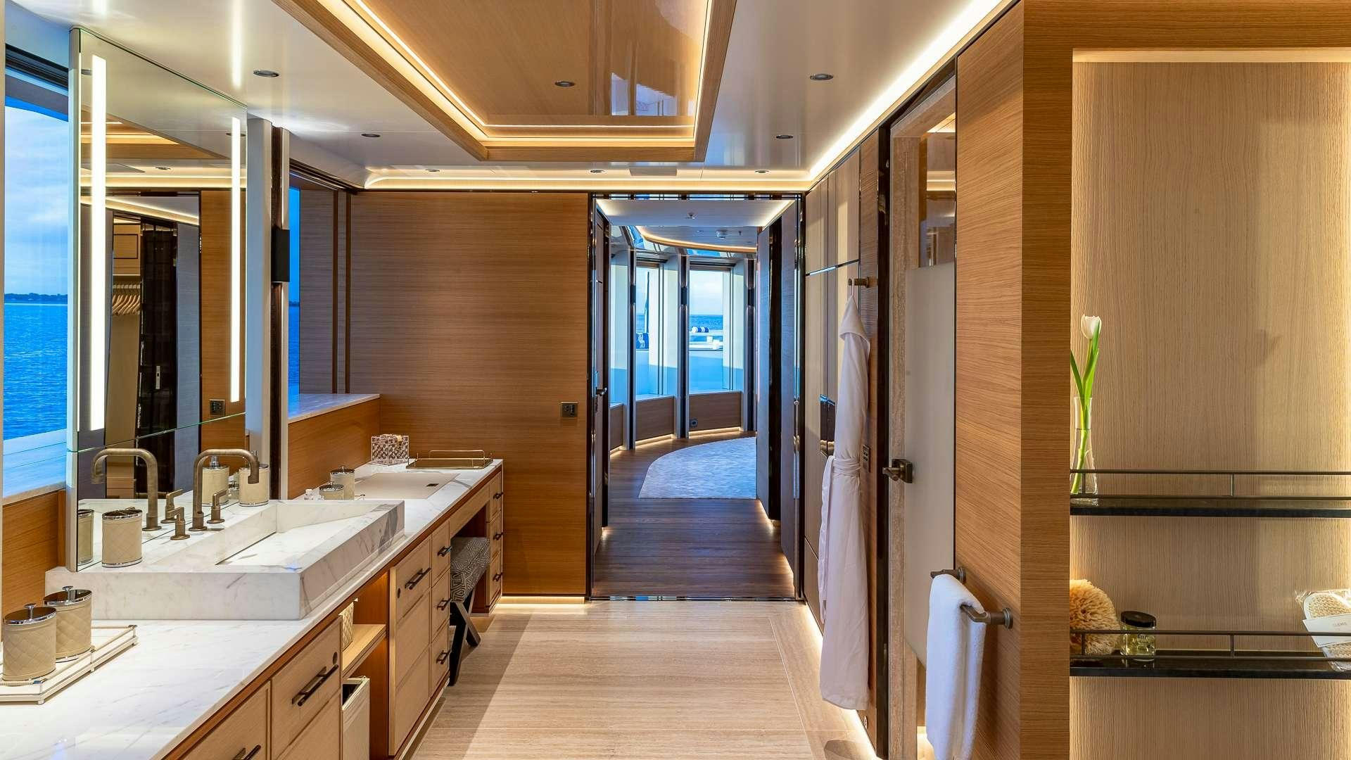 a bathroom with a large open door aboard TOP FIVE II Yacht for Charter